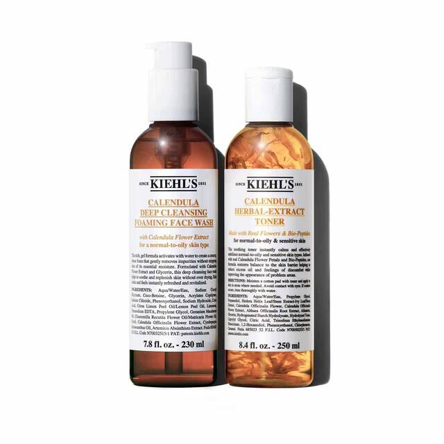 A graphic featuring two bottles: "KIEHL'S CALENDULA DEEP CLEANSING FOAMING FACE WASH" and "KIEHL'S CALENDULA HERBAL-EXTRACT TONER," both with clear packaging and white caps. The liquid inside each bottle is amber-colored. The products are shown against a white background.